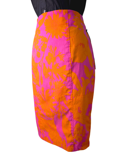 A bright pink and orange floral patterned pencil skirt shown on a mannequin torso against a plain white background.

Ruby De Vine ladies pencil skirt handmade on the Gold Coast featuring a 1950s-inspired fitted silhouette with back split and rear zip. Now available on Rockabilly Australia.